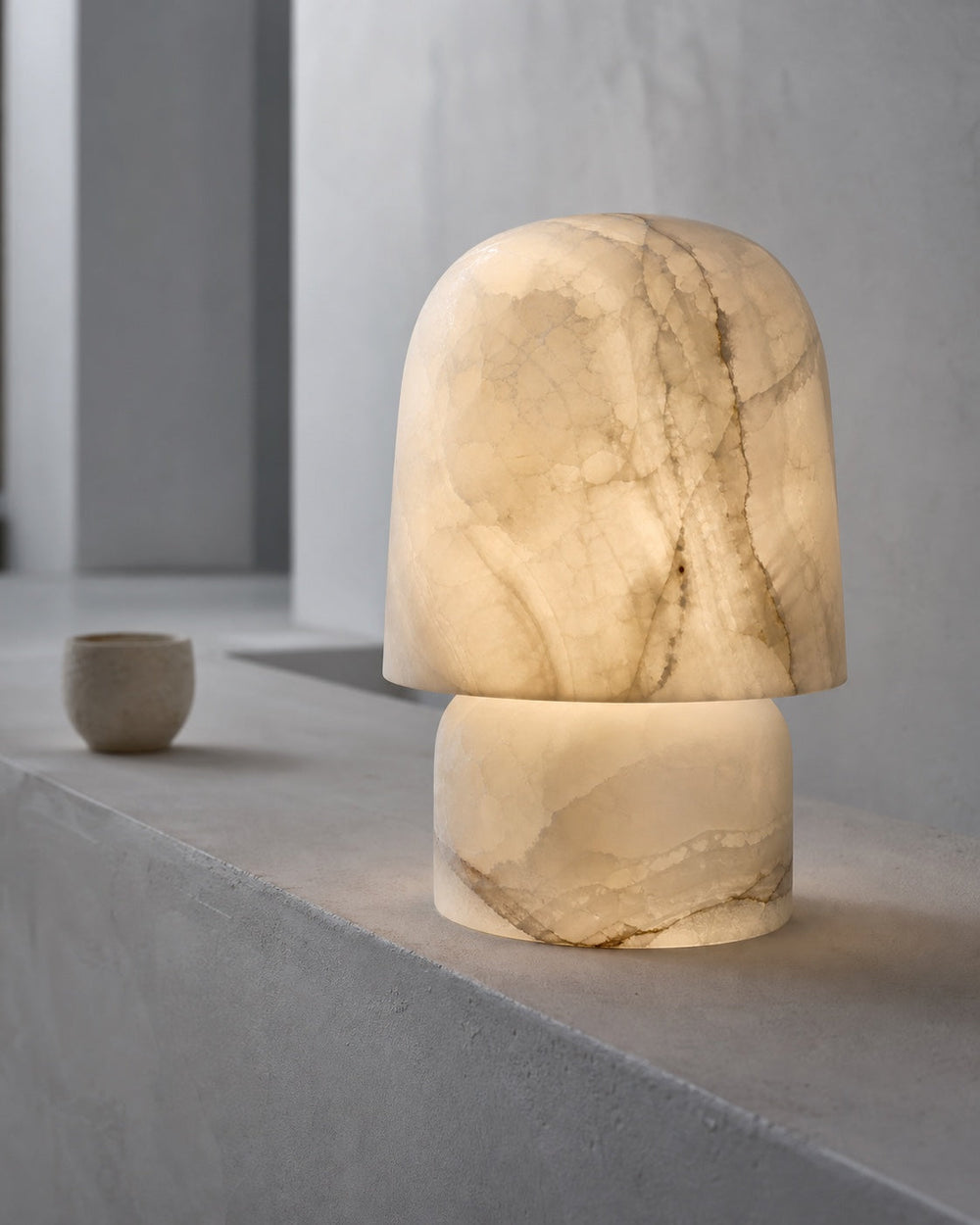 Alabaster lamp revealing natural stone energy through a soft mineral glow