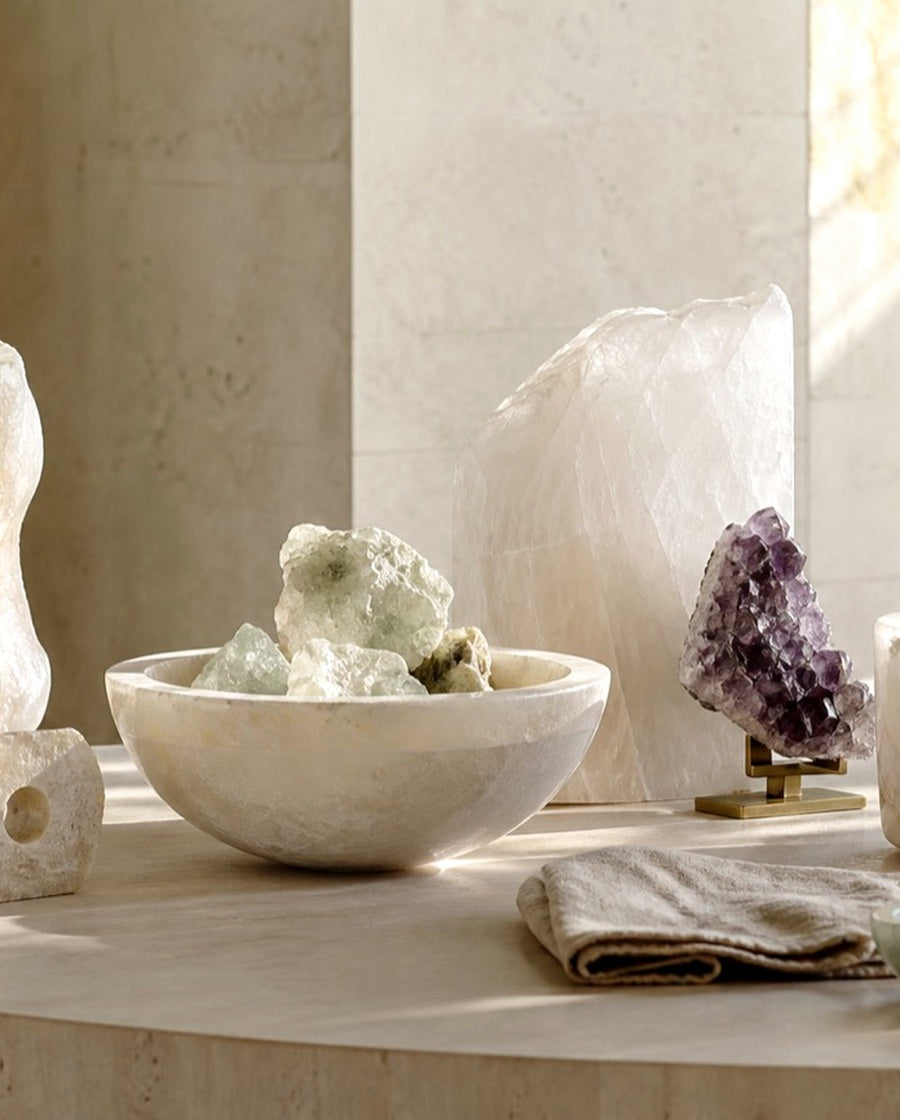 Stone vessel and luminous mineral objects in a refined ritual scene